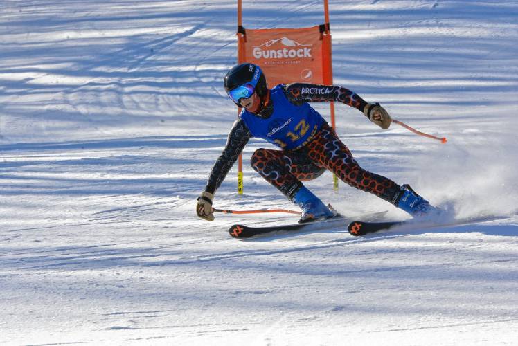 Kearsarge’s Alex Spinney competes in the giant slalom at the NHIAA Division III Alpine ski championship at Gunstock on Thursday. Spinney finished second in the slalom and third in the GS.