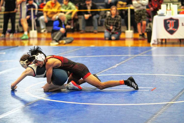 Concord’s Biswas Darji wrestles Windham’s Zoe Millette in the round of 16 of the 106-pound weight class during Saturday’s Division I wresting championship.