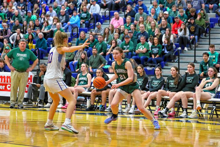 Annelise Dexter looks for a lane to drive to the basket for Pembroke during the D-II girls' basketball championship on March 10, 2024.