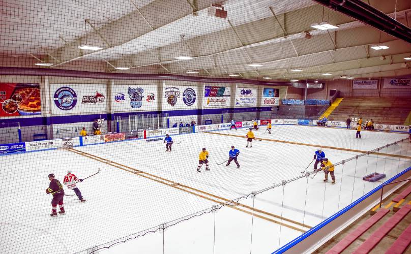 The hockey rink at Tri-Town Arena is split into three hockey areas for the Black Ice Hockey Tournament on Friday, March 22, 2024.