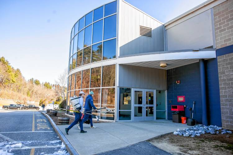 Players enter the Tri-Town Arena in Hooksett for the Black Ice Tournament on Friday, March 22, 2024. This is the first year the tournament at Tri-Town after one year at Everett Arena in Concord, and years at White Park.