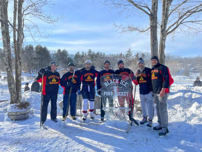 The Transformers during the 2022 Black Ice Pond Hockey Tournament at White Park in Concord. From left to right: Charlie Kickham, Sean Wachter, Ben Richards, Chris Moultrip, Jeff Labrecque, Ben Russo and Shawnn Vaillant.