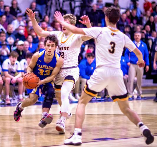 Kearsarge guard Noah Whipple was double-teamed most of the game against Conant on Tuesday night, February 20, 2024 at the Bow High School gym during the D-III semi-finals.