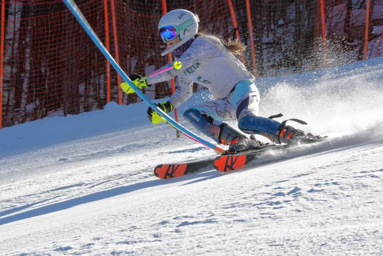 Hopkinton’s Marcella Guadagno competes in the slalom at the NHIAA Division III Alpine ski championships at Gunstock on Wednesday. Guadagno finished second in both the giant slalom and slalom to help the Hawks successfully defend their team title.