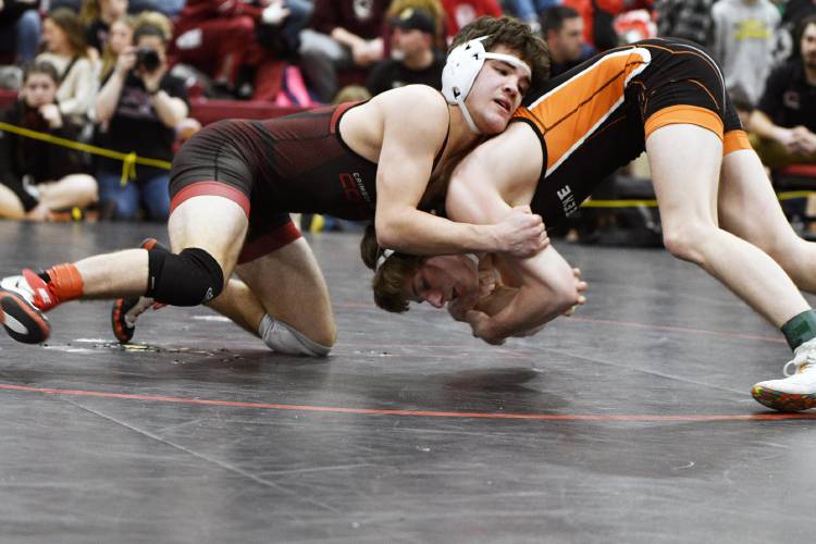 Concord’s Griffin Norwalt (left) wrestles Keene’s Carter Trubiano in the 126-pound semifinals at the NHIAA Meet of Champions on Saturday.