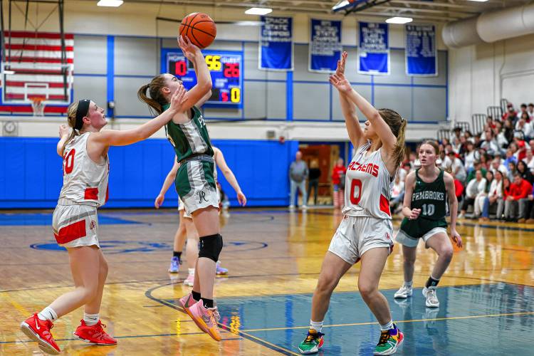 Pembroke freshman Anne Phillips takes a jumper against Laconia in Wednesday’s Division II semifinal.
