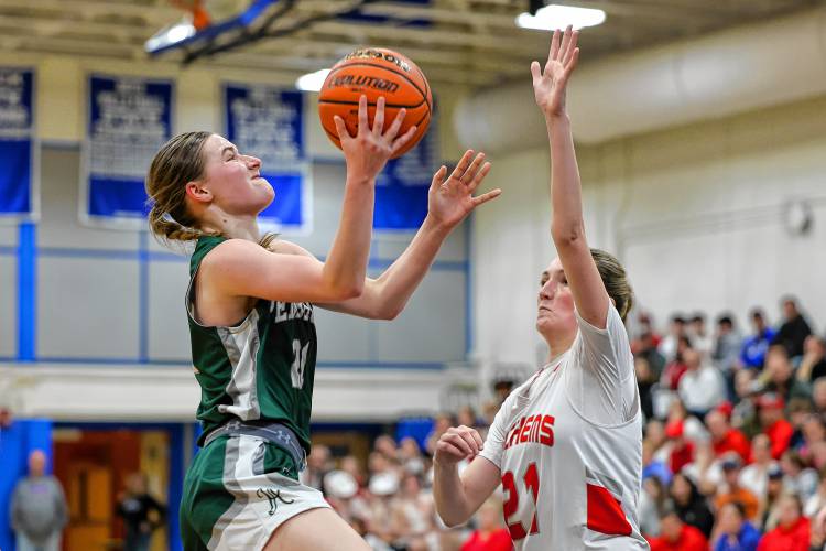 Annelise Dexter drives to the basket for Pembroke in the Spartans' 44-35 D-II semifinal win over Laconia on Wednesday.