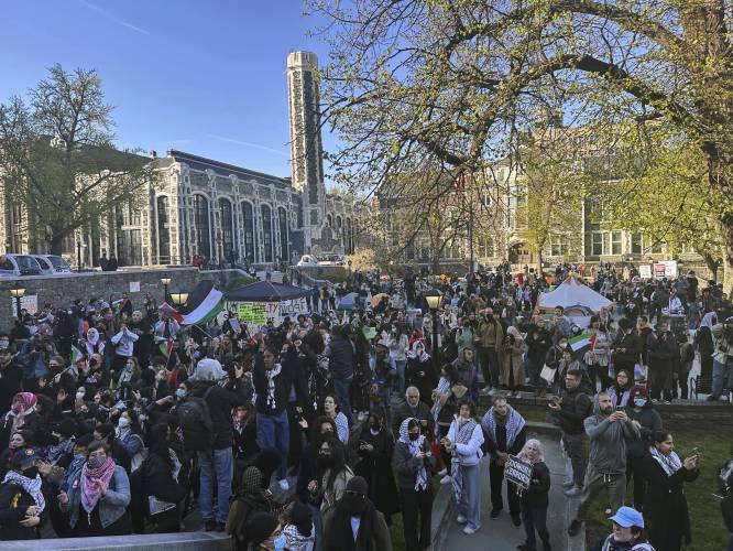 UC Berkeley law student Malak Afaneh speaks to a crowd of pro-Palestinian protesters during a protest on the campus of UC Berkeley in Calif., on Monday.