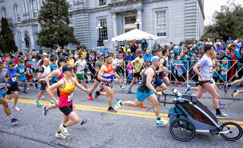 The first wave of runners start the 22nd Annual Rock’ N Race on North State Street in back of the State House on Wednesday evening, May 8, 2024.