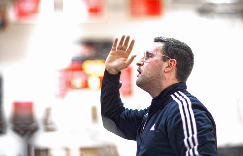 The Coe-Brown Northwood Academy Band, led by Jon Ludwig (left) plays during an NHIAA Division II boys’ basketball game between Coe-Brown and Pelham on Tuesday night in Northwood.