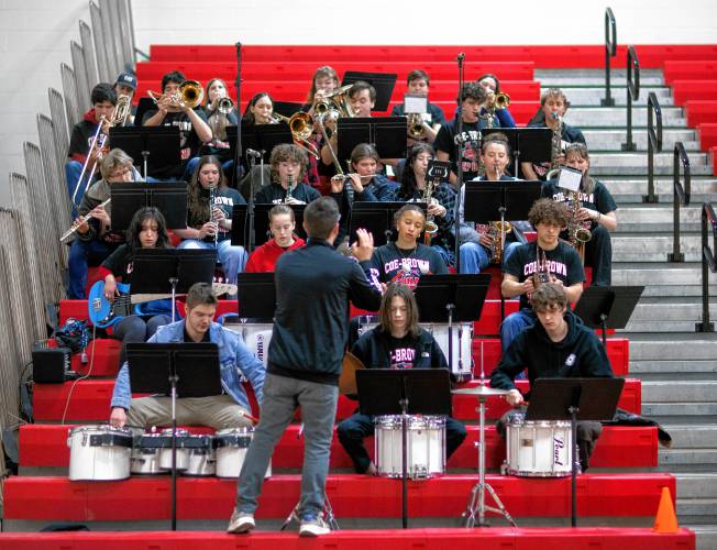 The Coe-Brown Northwood Academy Band led by Jon Ludwig plays during the game between Coe-Brown and Pelham on Tuesday night, February 18, 2025.