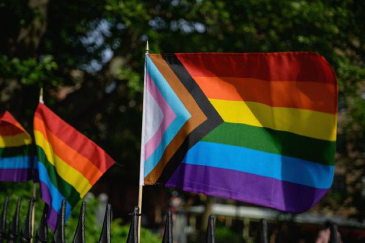 A Progress Pride flag and rainbow flags are seen at the Stonewall National Monument in 2020 in New York City.