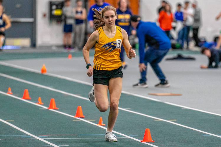 Bow’s Hannah Pawlowski races towards the finish line to claim the 600 meter title at the NHIAA Division II indoor track & field championships on Sunday at Plymouth State.