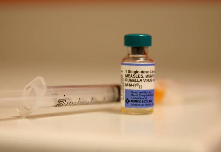 A bottle containing a measles vaccine.