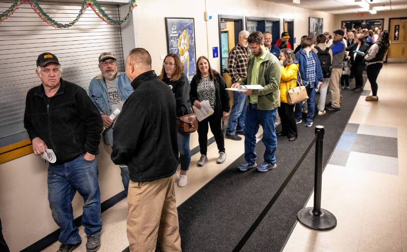 The line for voting before the Merrimack Valley School District meeting went from inside near the gym to outside into the parking lot on Thursday, March 6, 2025.