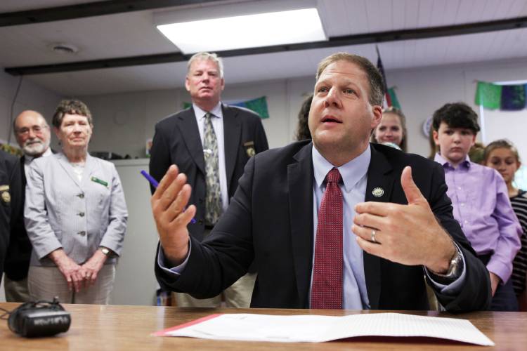 New Hampshire Gov. Chris Sununu signs a school choice bill on Thursday, June 29, 2017, at the Croydon Village School in Croydon, N.H. (Valley News - Jovelle Tamayo) Copyright Valley News. May not be reprinted or used online without permission. Send requests to permission@vnews.com. 