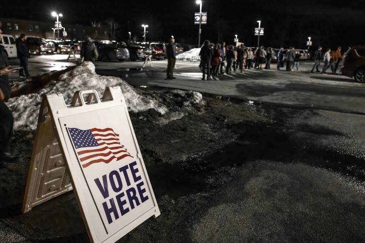 The line for voting before the Merrimack Valley School District meeting went outside into the parking lot on Thursday, March 6, 2025.