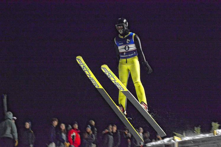 Merrimack Valley’s Wyatt King flies through the air in a ski jumping competition at Plymouth. King finished 14th.