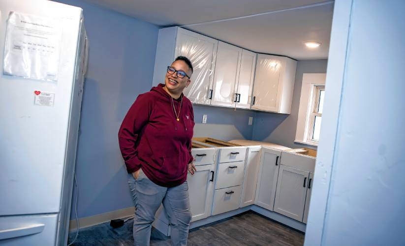 Glenda Leon, director of emergency housing at the Friends Program, shows the new kitchen on the second floor during a tour of the remodel of the Thompson Street facility for families on Wednesday, May 8. The kitchen will have three refrigerators as they took down a wall to expand the area.