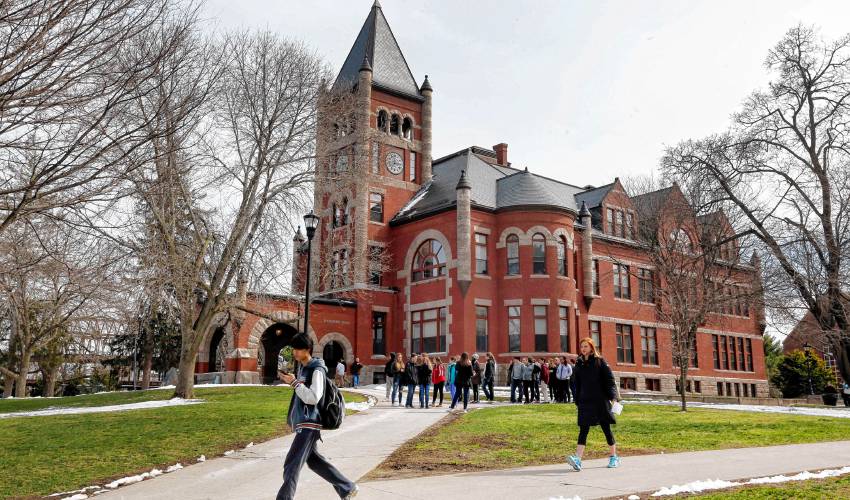 In this photo taken Wednesday April 6, 2016 students walk past the historic Thompson Hall at the University of New Hampshire in Durham, N.H. (AP Photo/Jim Cole) In this photo taken Wednesday April 6, 2016 students walk past the historic Thompson Hall at the University of New Hampshire in Durham, N.H. (AP Photo/Jim Cole)