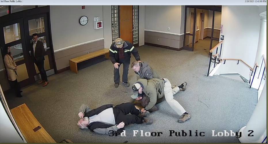 ICE agents arrest Arnuel S. Marquez Colmenarez, 33, as he arrives for his arraignment on misdemeanor charges at a courthouse in Nashua on Feb. 20.