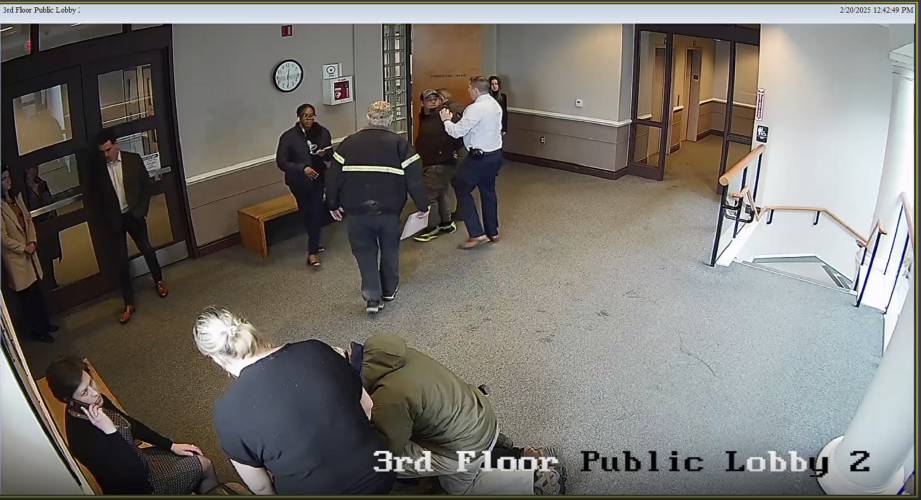 In this image made from video provided by New Hampshire Judicial Branch on Monday, April 14, 2025, ICE agents arrest Arnuel S. Marquez Colmenarez, top right, 33, as he arrives for for his arraignment on misdemeanor charges at a courthouse in Nashua, N.H., on Feb. 20, 2025. (New Hampshire Judicial Branch via AP)
